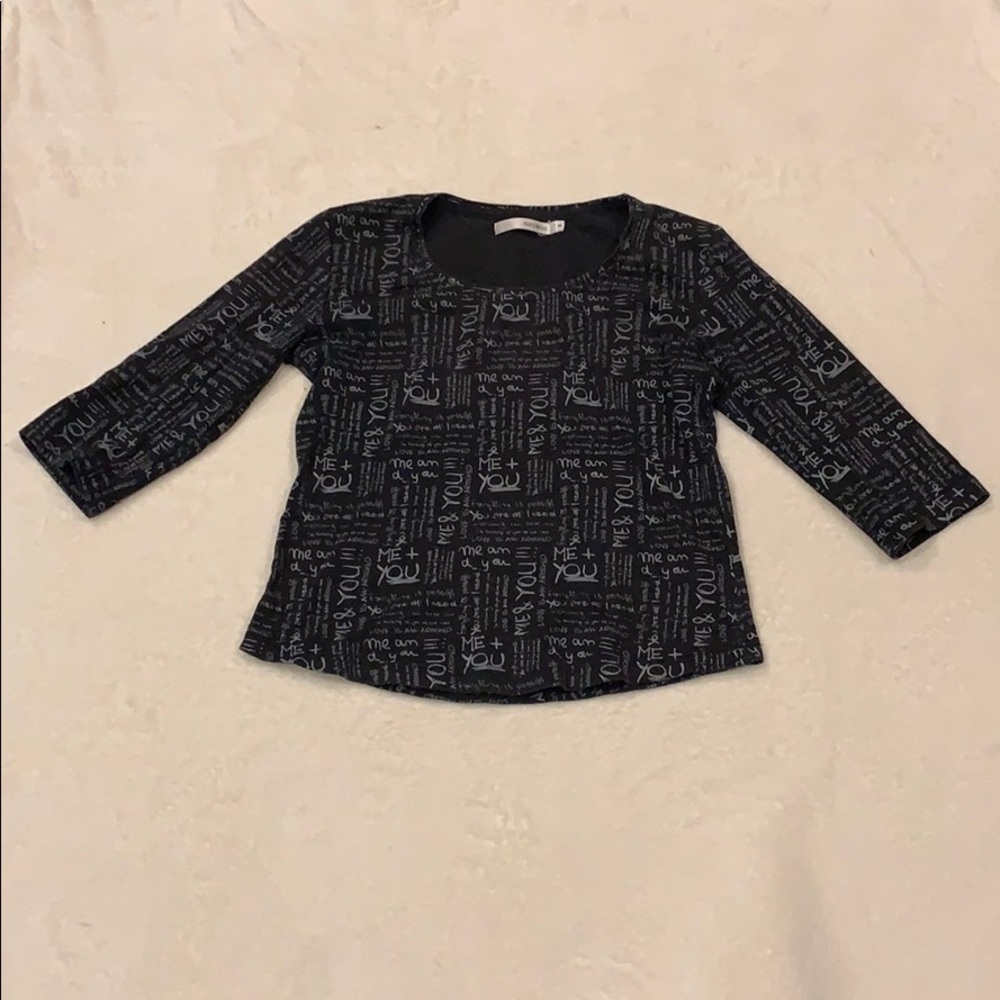 Black and grayish/white shirt